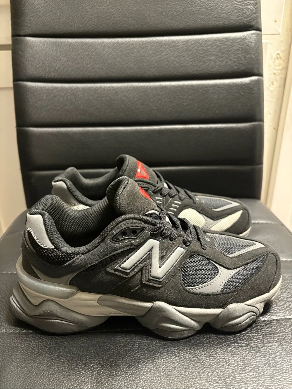 New Balance Kids Black and Gray Athletic Sneakers with Red Logo Accent